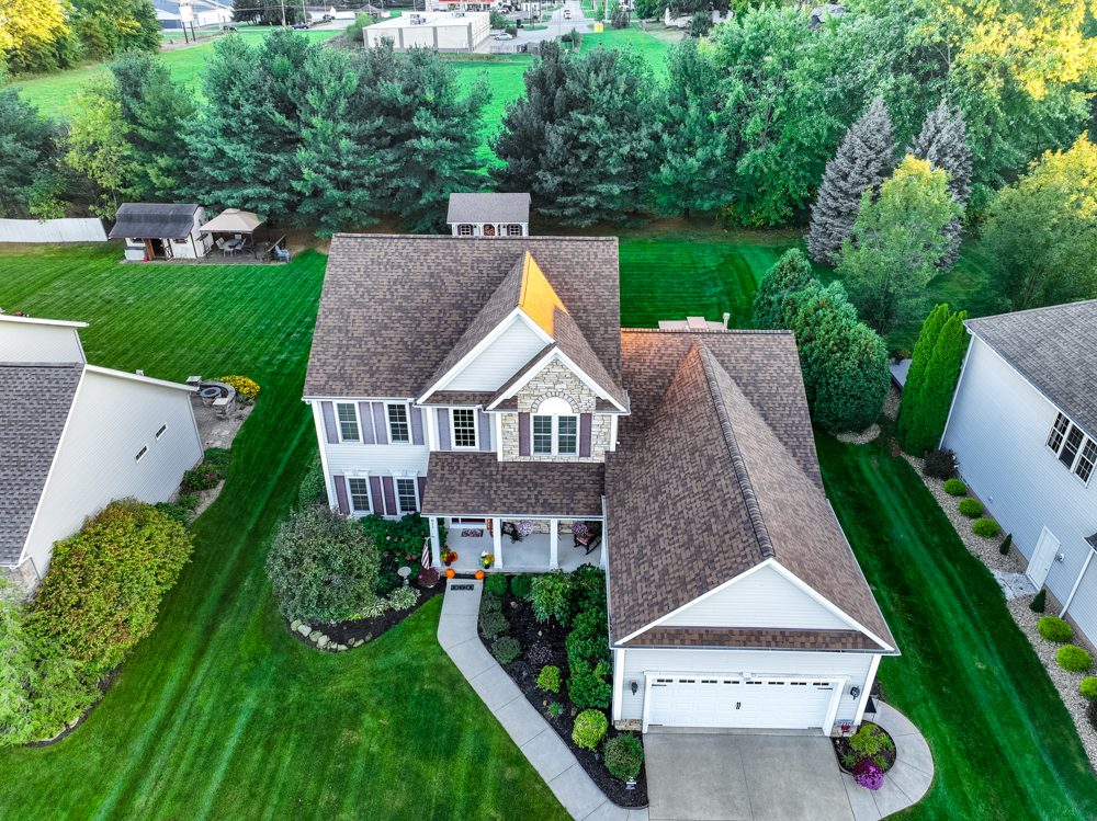 Aerial drone photo of a completed Firestone roofing project in Northeast Ohio