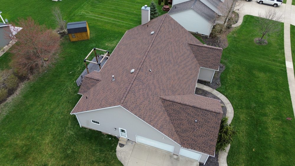 Aerial drone photo of a completed Firestone roofing project in Northeast Ohio
