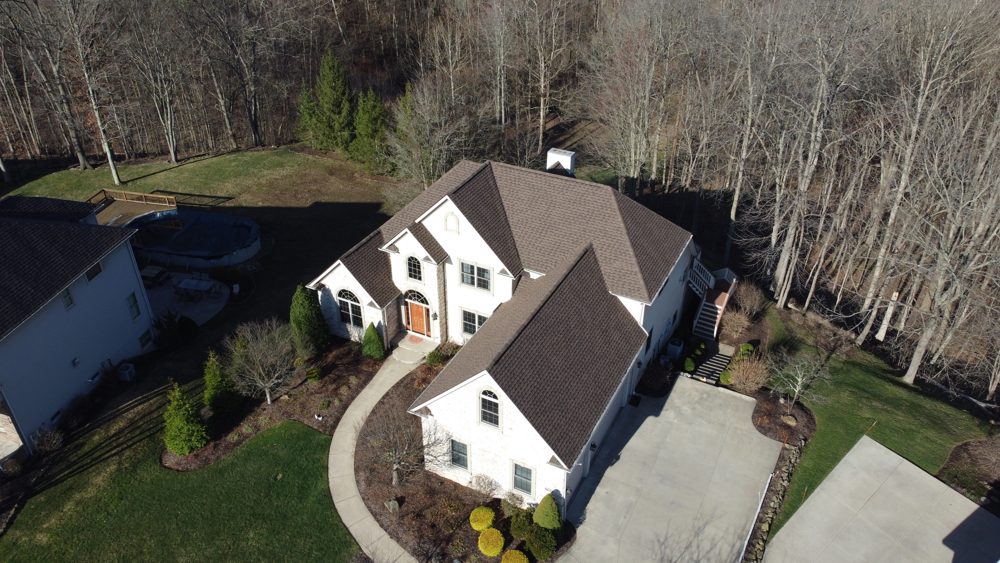 Aerial drone photo of a completed Firestone roofing project in Northeast Ohio
