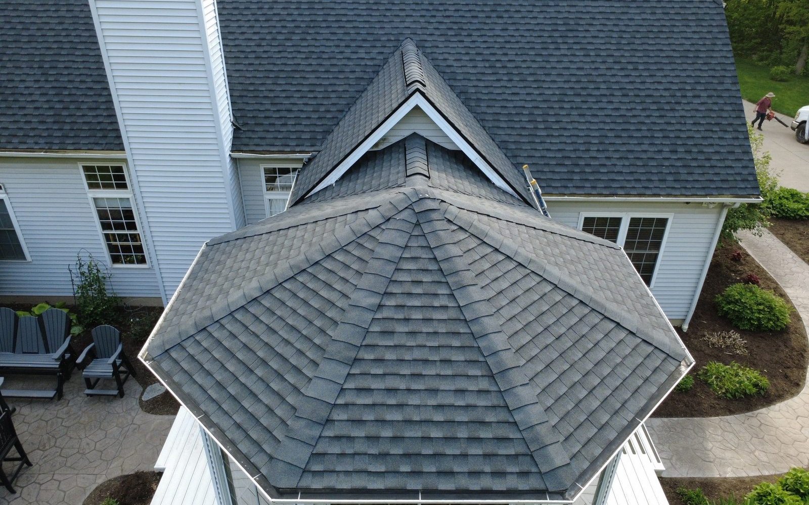 Aerial drone view of a completed roof replacement in Seville, Ohio (Medina County) by Firestone Roofing & Restoration.